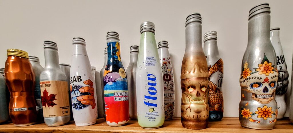 Custom aluminum bottles in shaped and printed designs made by Kingston Aluminum Technology